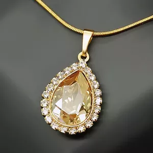 Kulons "Debesu Piliens (Golden Shadow)" ar Swarovski™ kristāliem