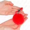 Krūšu spīles KINK — Kažokādas bumbiņa, sarkana 6 cm Photo 3