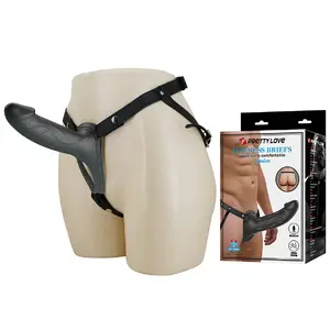 Strap-on harness with vibrating dildo, pretty love Landon Black — single motor vibrator, discreet design
